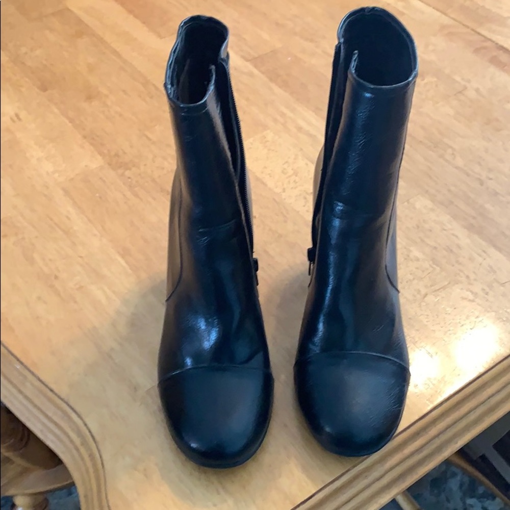Above the ankle but not quite mid calf black boots